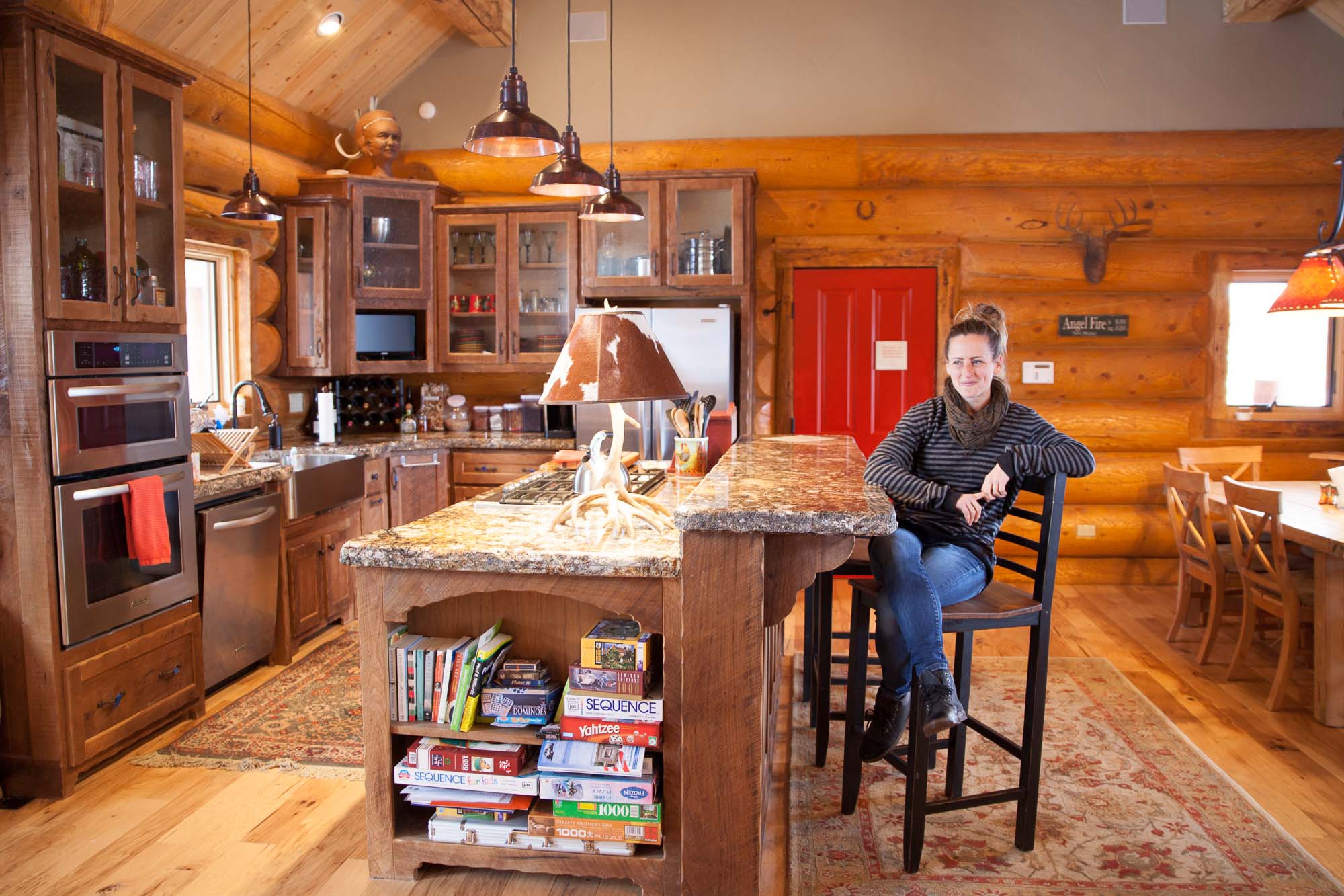 Custom designed & built log home kitchen in Northern New Mexico by Mammoth Mill & Construction